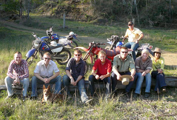 Work and Travel farm work participants with cross-bikes